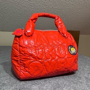 Orange Quilted Harajuku Lovers Puffer Bag by Gwen Stefani